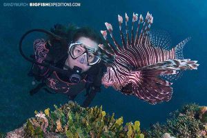 Diver with a lionfish