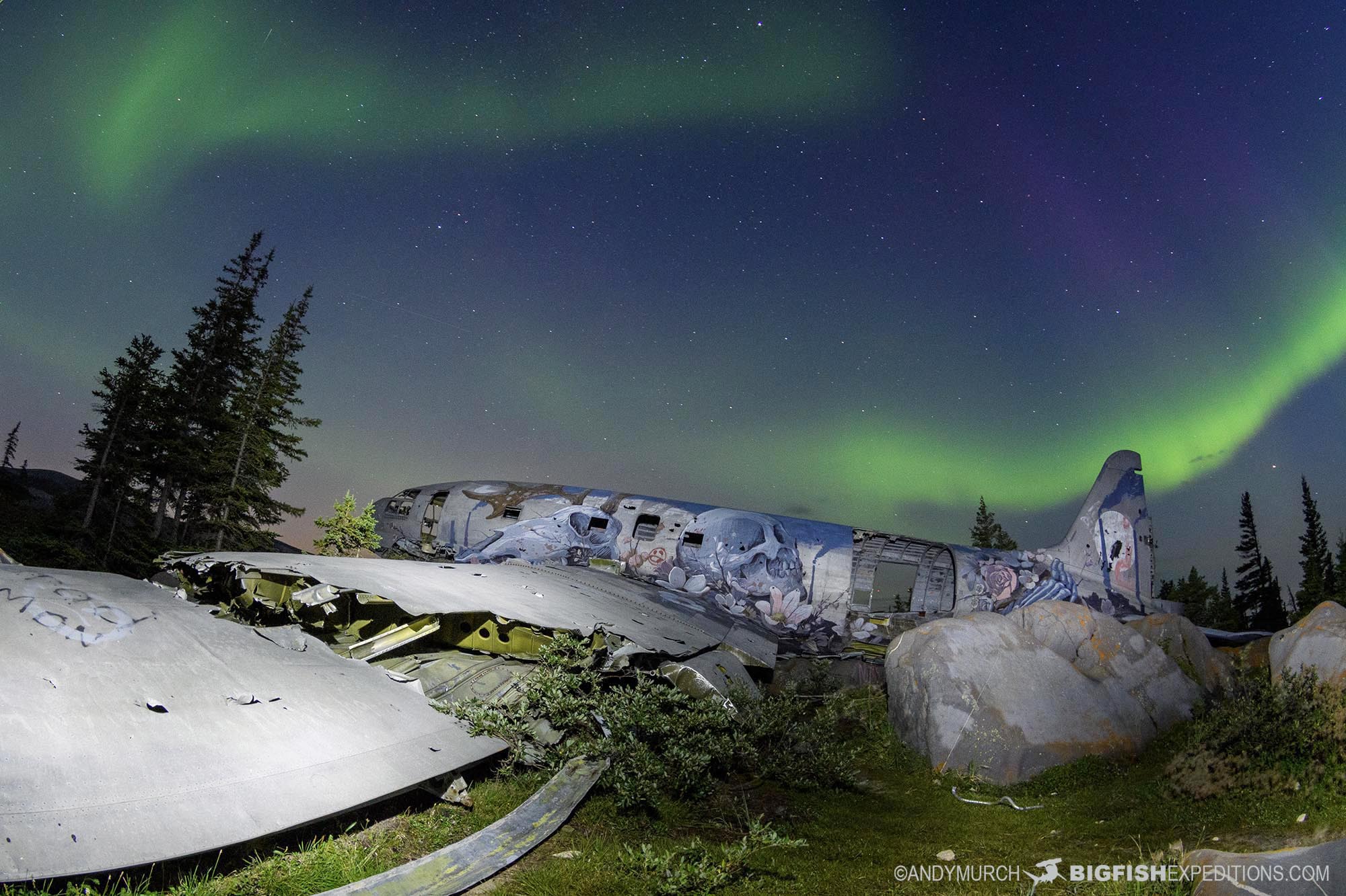 Photographing the Northern Lights over Miss Piggy in Churchill, Canada.